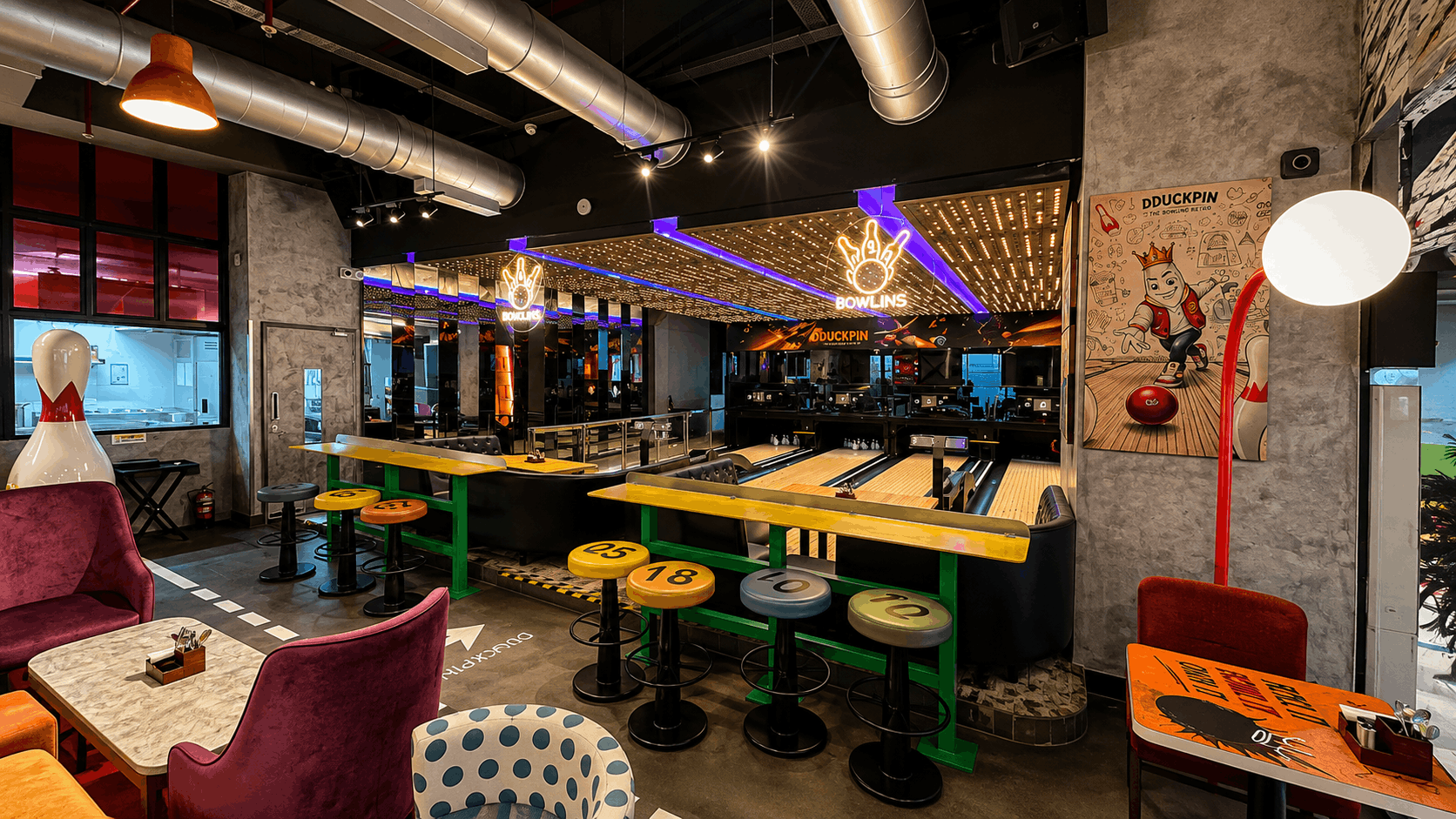 Colour-Coded Bar Stools & Oversized Bowling Pin
